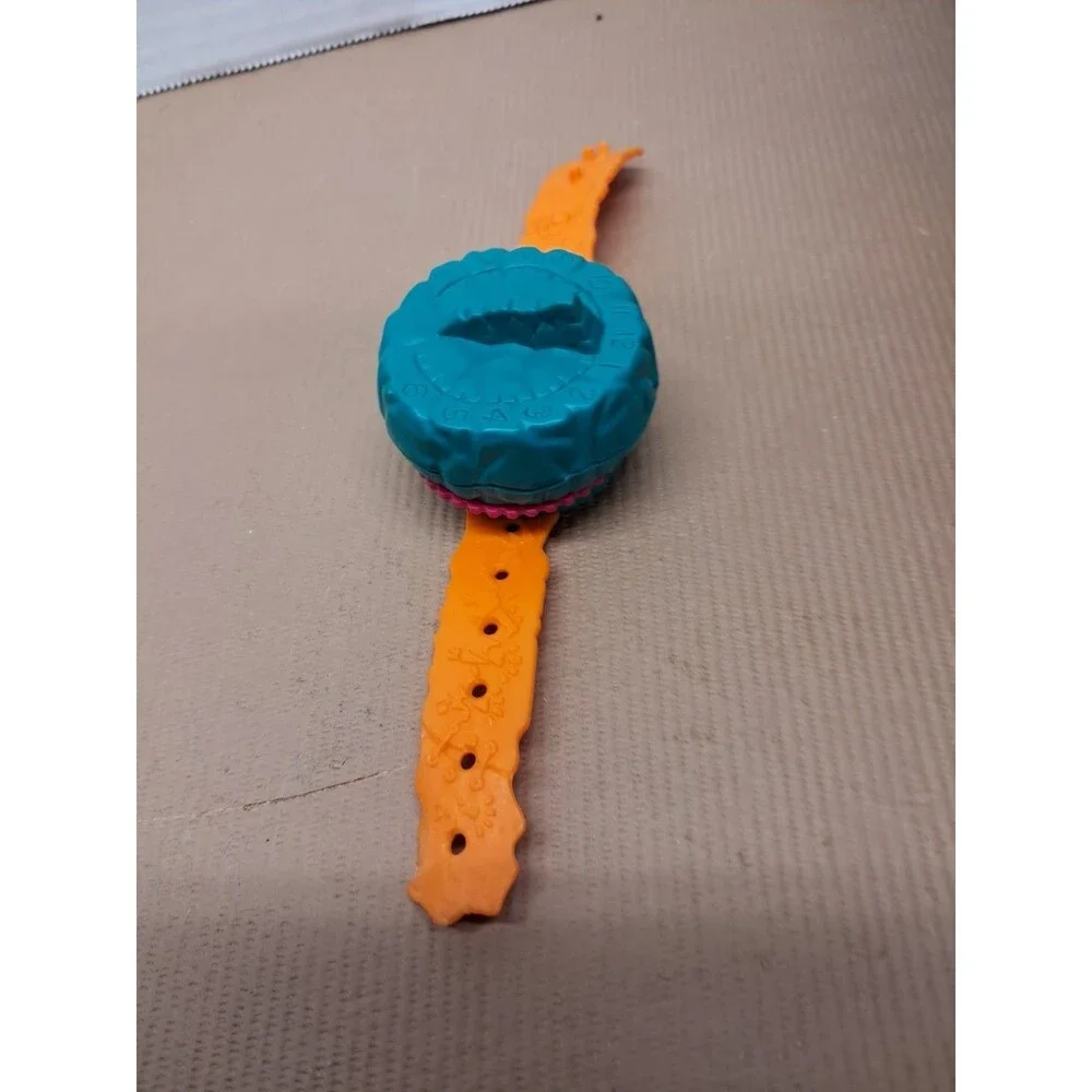 1996 Wendy's Kids Meal Toy Pre Historic Style Wrist Orange & Green